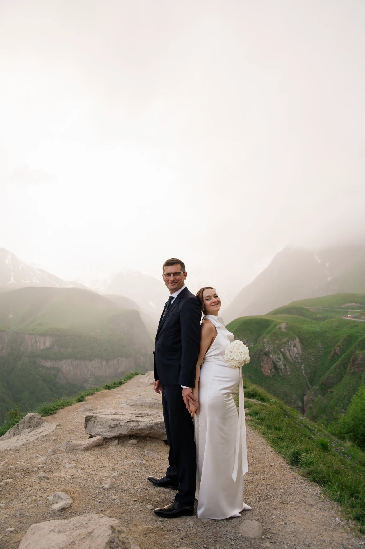 Newlyweds at a wedding photo shoot in the mountains of Georgia