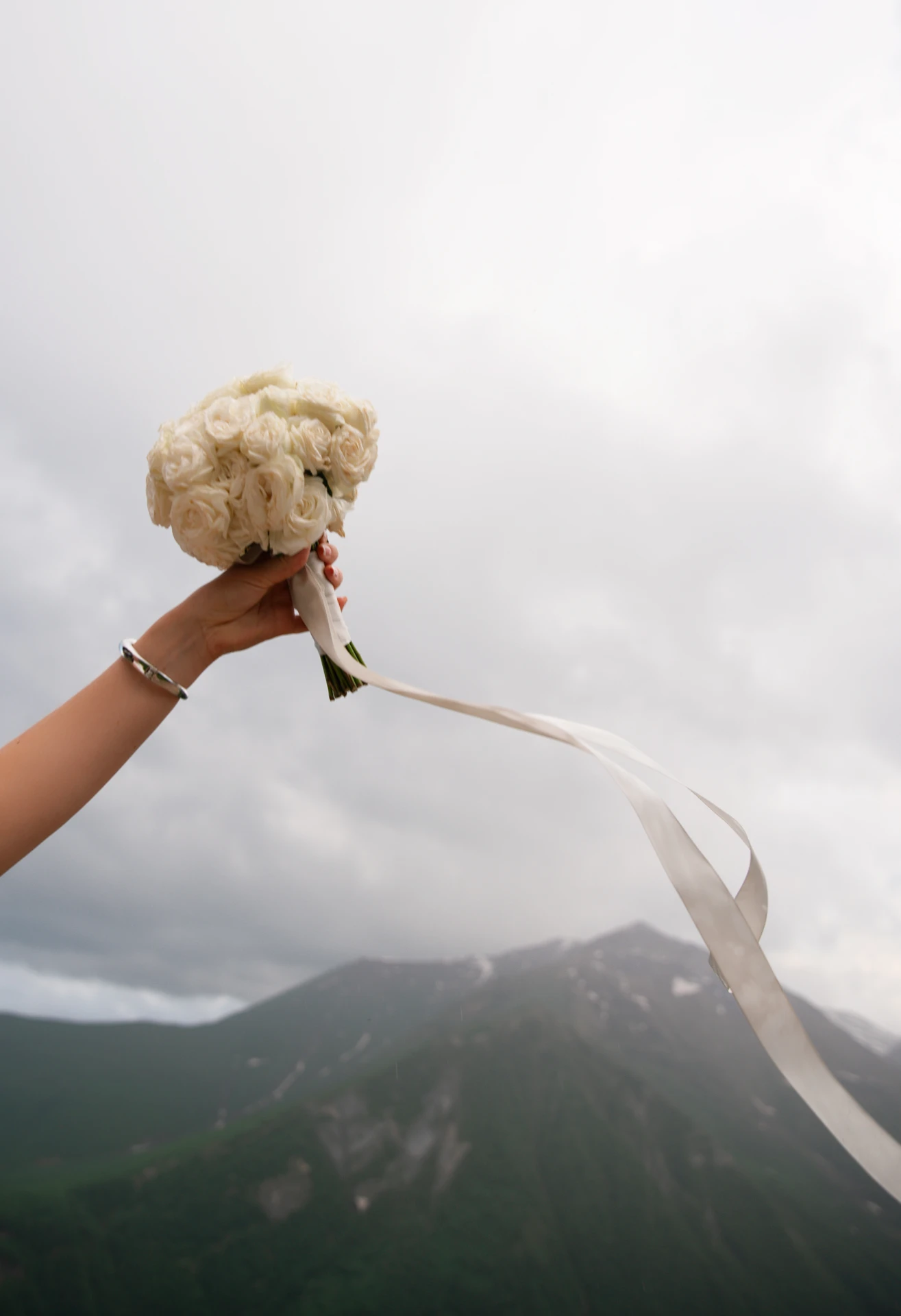 Newlyweds during their wedding in the mountains of Georgia