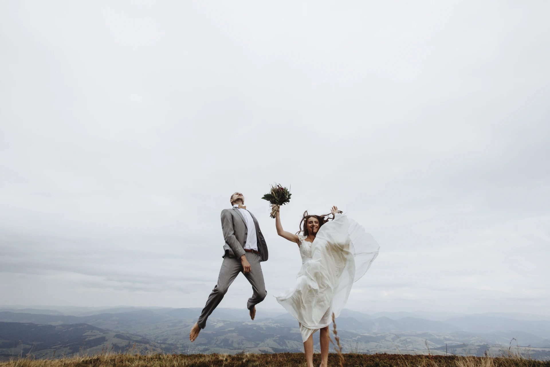 Foreign couple against the backdrop of the mountains of Georgia